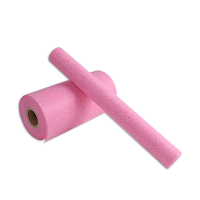 ピンクの浮彫りにされたPPの非編まれた包装紙のギフトの包装材料